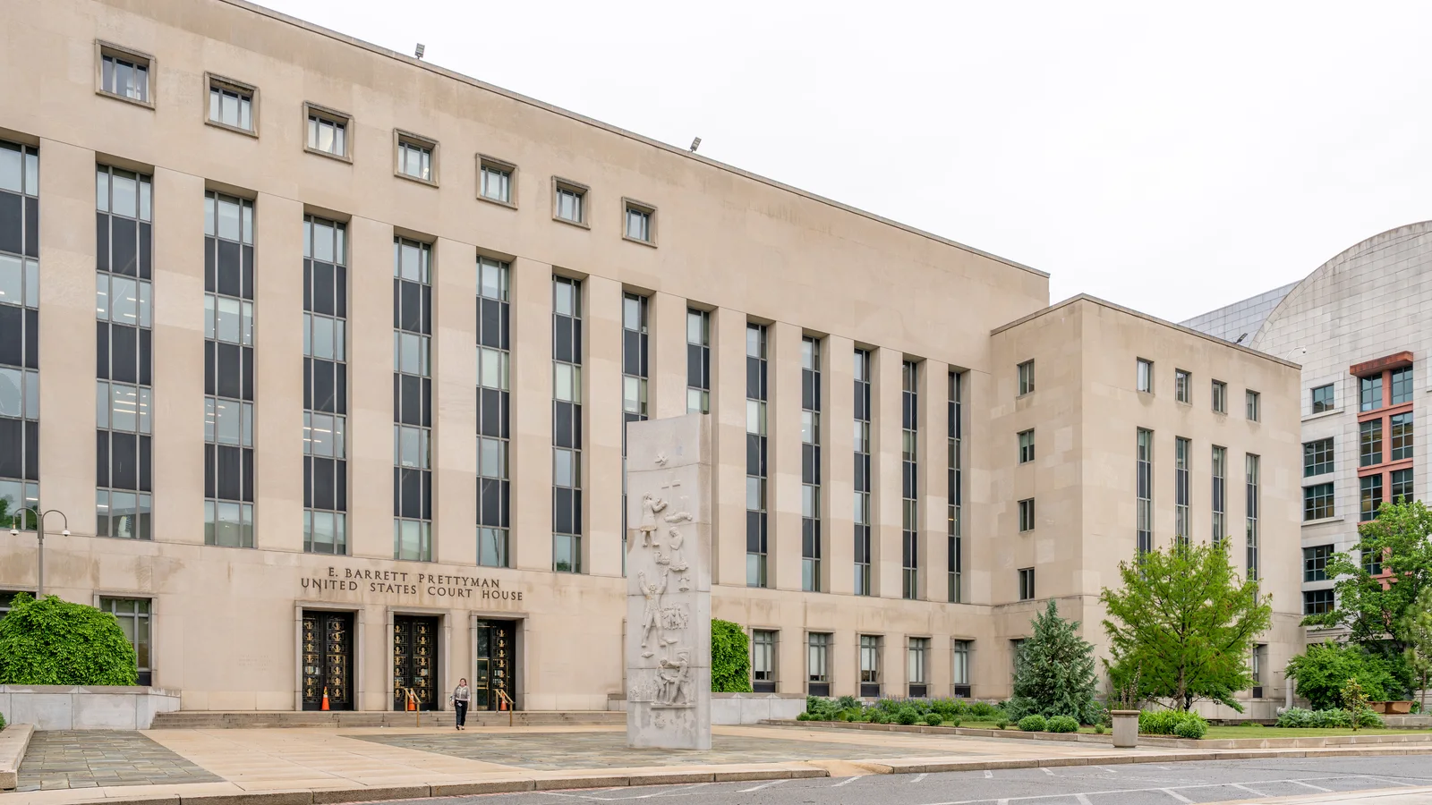 Stone federal courthouse with broad steps and columns in Washington, D.C.