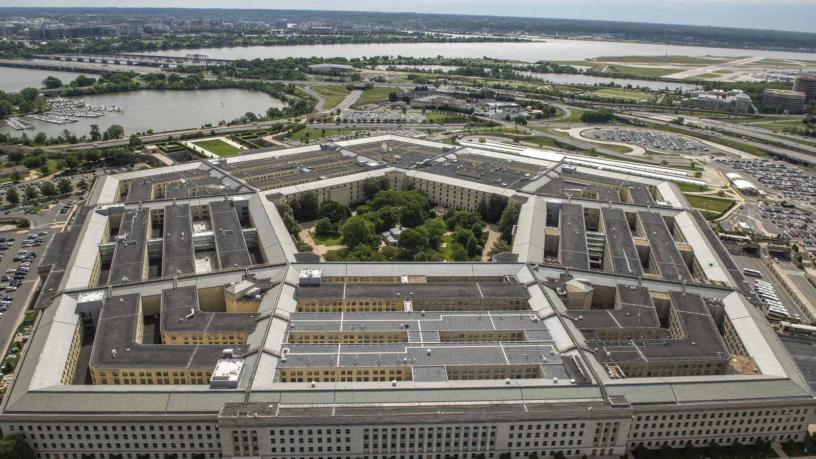Aerial view of the Pentagon and its surrounding roads and parking areas.