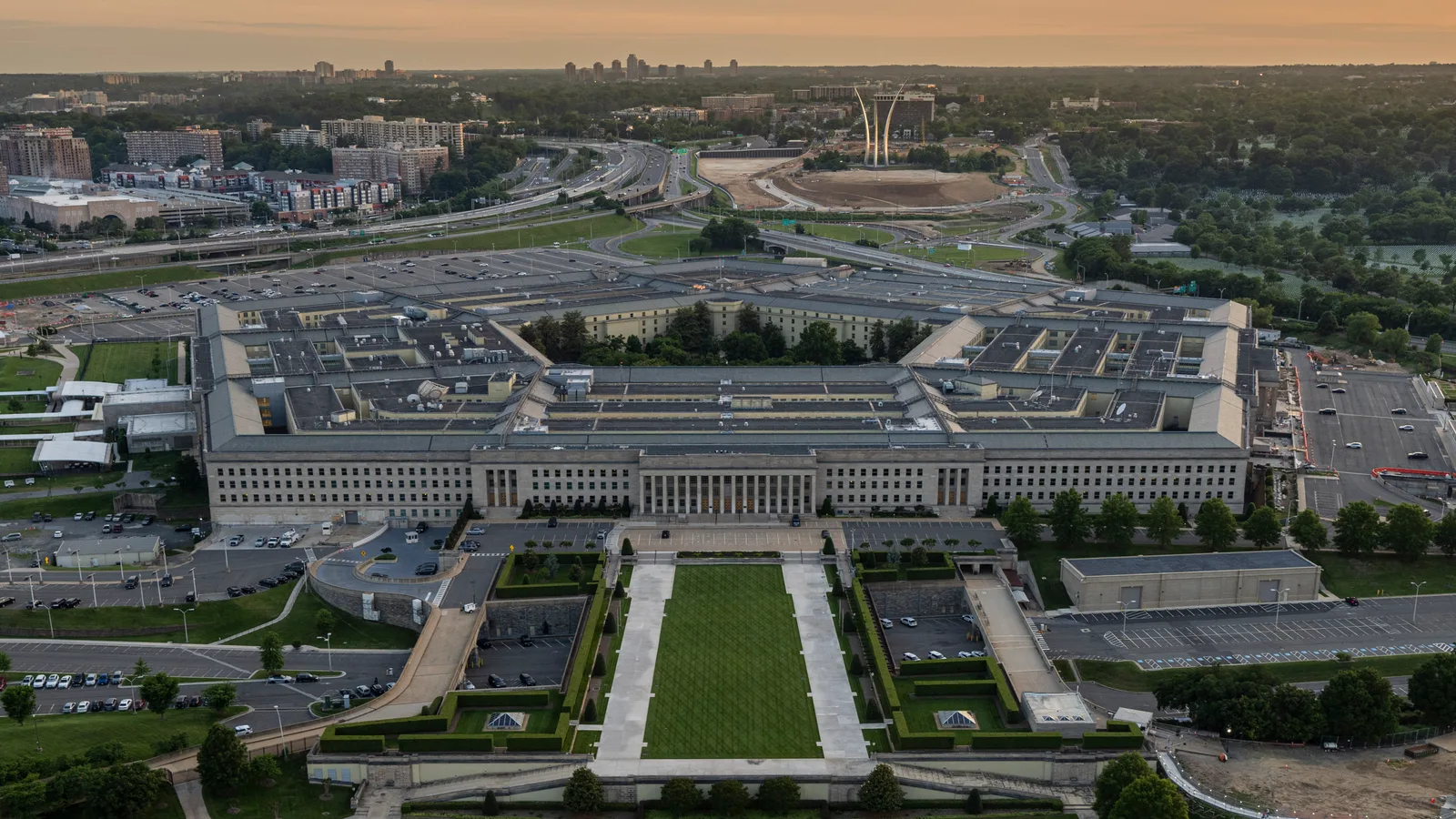 An aerial view shows the five-sided Pentagon complex and surrounding roads.