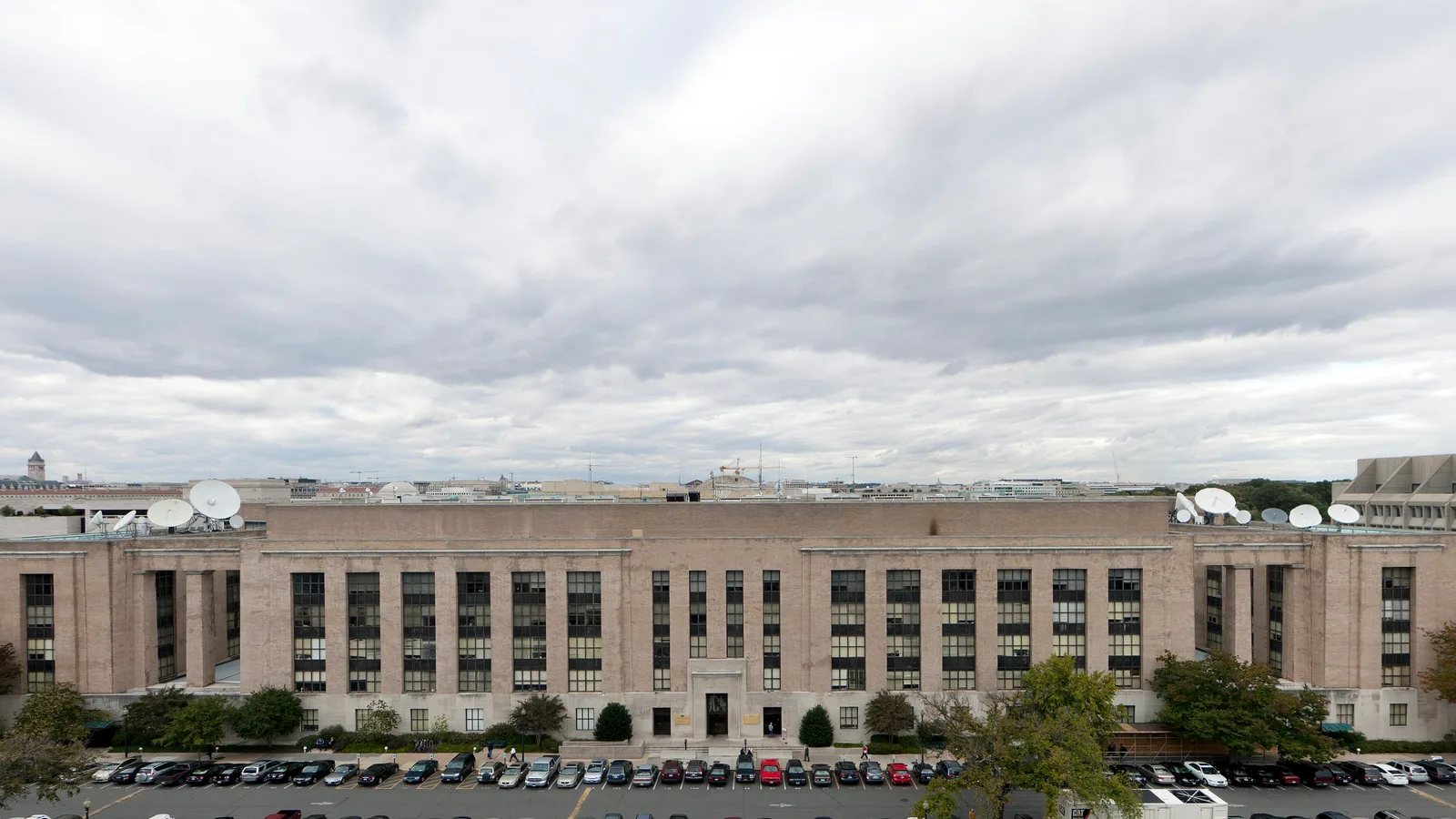 Wide exterior view of the Wilbur J. Cohen Federal Building in Washington.